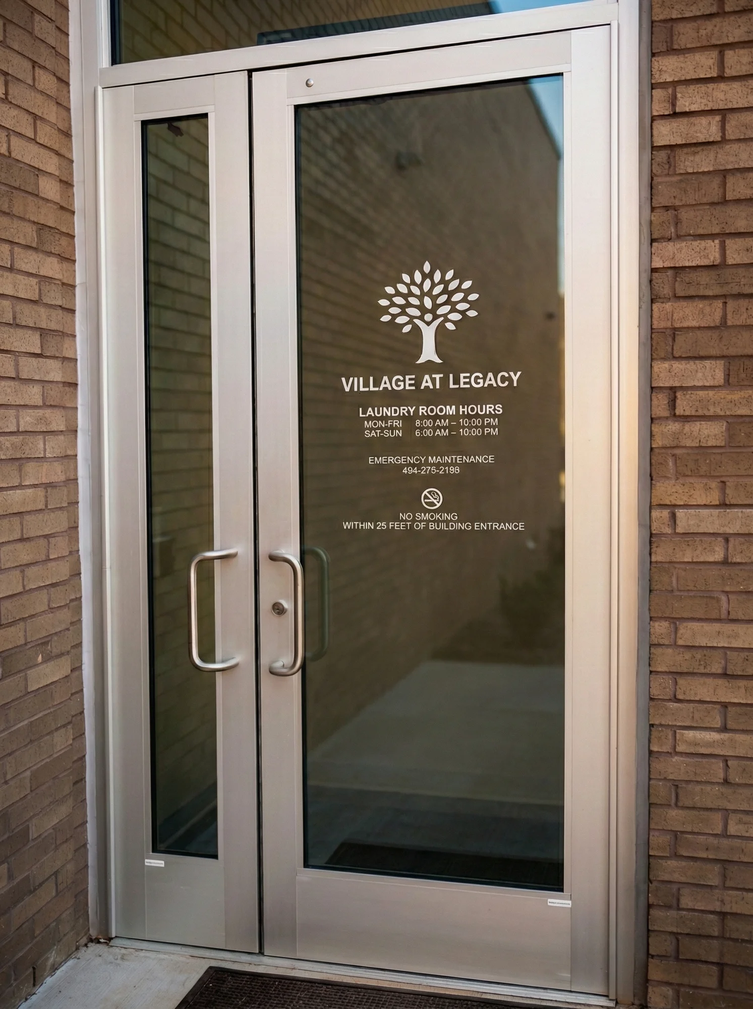 Custom window graphics for Village at Legacy Apartments