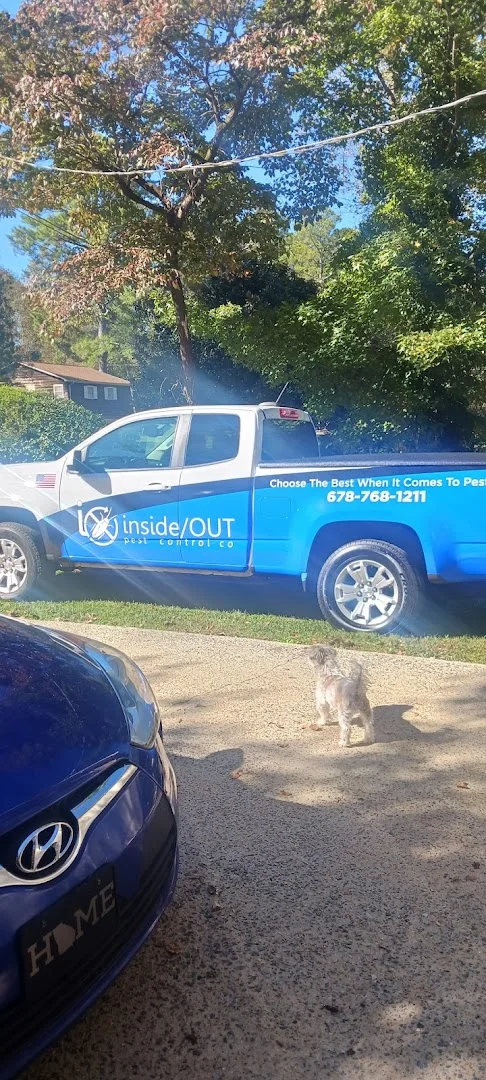 InsideOUT branded pickup truck with custom blue vehicle wrap