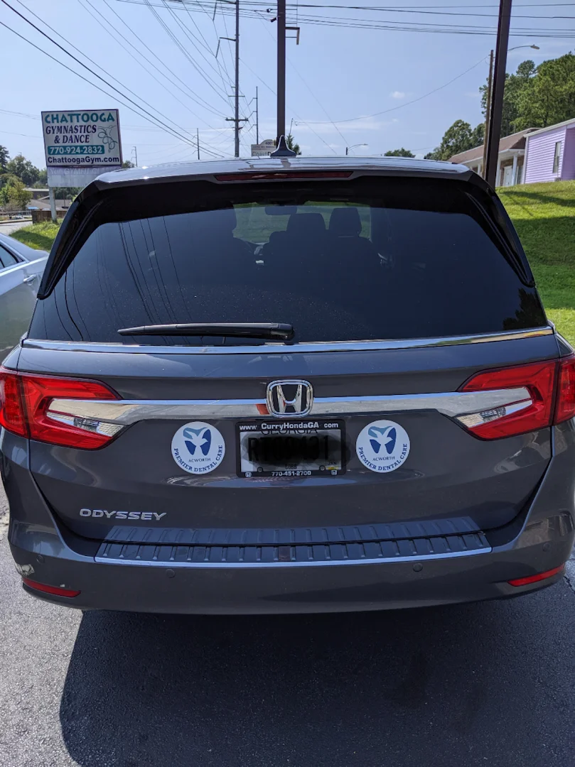 Honda Odyssey with Premier Dental Care vehicle decals