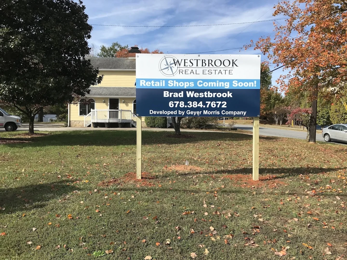 Westbrook Real Estate property yard sign advertising retail shops coming soon